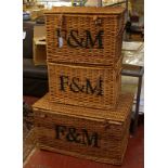 Three Fortnum & Masons cane work hampers (two 57cm, one 76cm) all stencilled 'F&M' to front