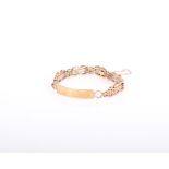 An early 20th century rose gold fancy gate bracelet with later added yellow identity panel