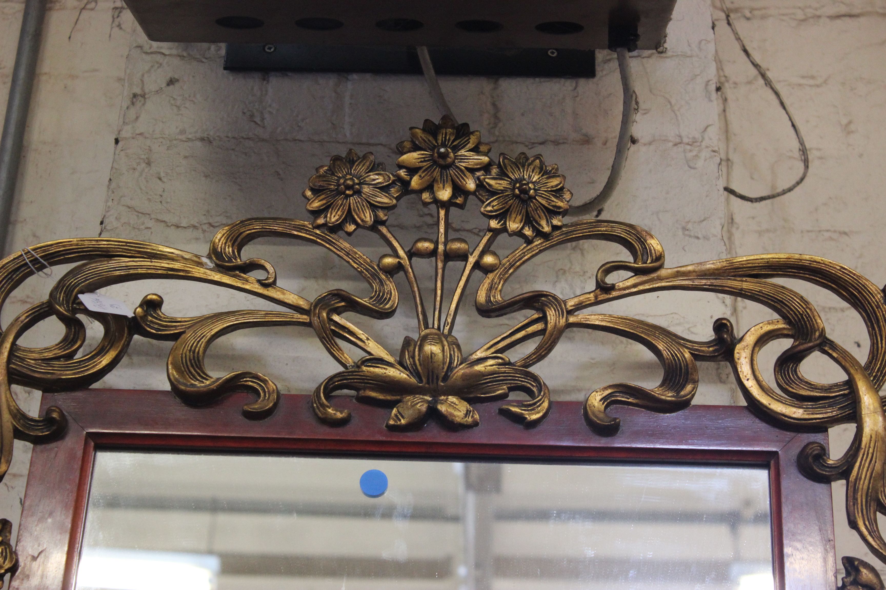 An Art Nouveau style wall mirror with floral gilt cresting 115 x 67cm - Image 2 of 2