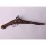 A Flint lock pistol with walnut casing, no marks apparent, slight rusting, possibly late 18th