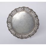 A Victorian silver shaped-round waiter, with a shaped beaded border pierced with flowers and foliate