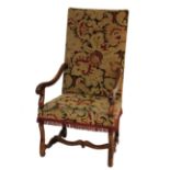 An 18th Century and later walnut open armchair with shaped 'H' stretcher covered in tapestry,