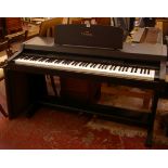 A Yamaha Clavinova electronic piano/keyboard (five instrument selection) LLP-311