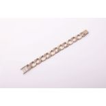 A 9ct gold part textured curb link bracelet, Sheffield 1973, 43.3g