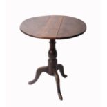 An 18th century provincial oak tripod tableTop diameter 63 cm