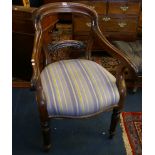 A 19th century mahogany yoke back library chair