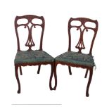 A pair of Anglo-Indian padouk side chairs, 19th Century