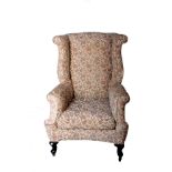 A Queen Anne style wing armchair