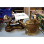 A 19th Century brass fender, a set of Victorian scales and a brass kettle (3)