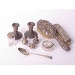 A collection of silver and silver mounted items; comprising; a pair of loaded short round