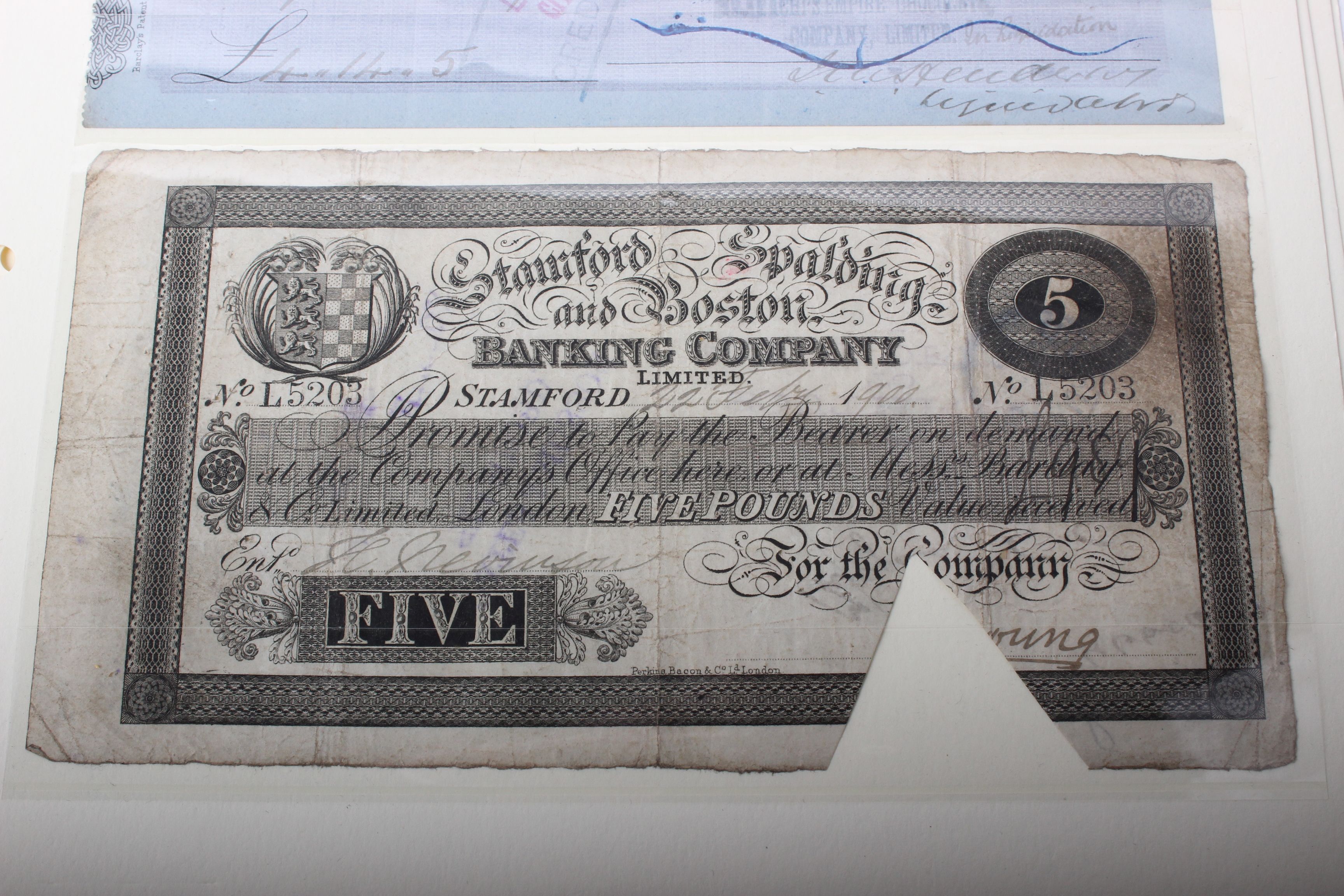 Bank notes; collection of seven early notes and cheques including Stamford, Spalding and Boston;