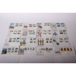 Stamps of the Isle of Man. Bulk stock of first day covers in five boxes. Issue dates up to 1976