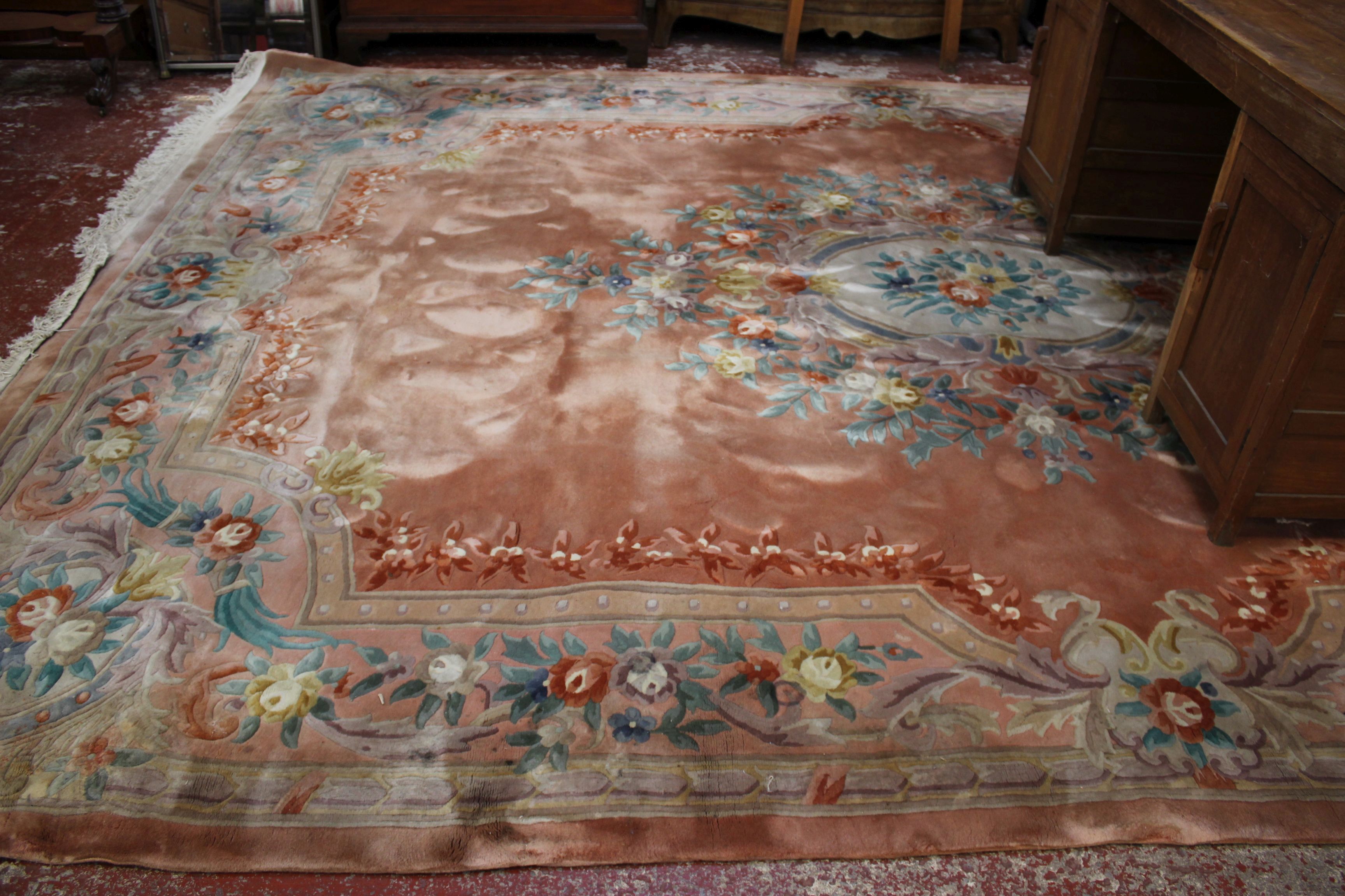 A large Chinese carpet 310 x 430cm