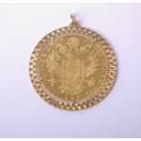 A re-strike Austrian gold 4 Ducat 1915, mounted in a modern Italian pendant mount stamped ‘750’,