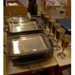 Silver plate: a galleried tray, two serving dishes, a set of six goblets, cutlery, a butter dish,