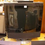 A Bang & Olufsen TV Beovision MX 4002 type 8732 with swivel stand and remote control