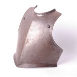Armour: a Cromwellian period breast plate with two raised rivets, turned border, h. 41cm w.34cm