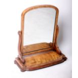 A Victorian satin birch swing dressing mirror with platform stand, 68cm wide