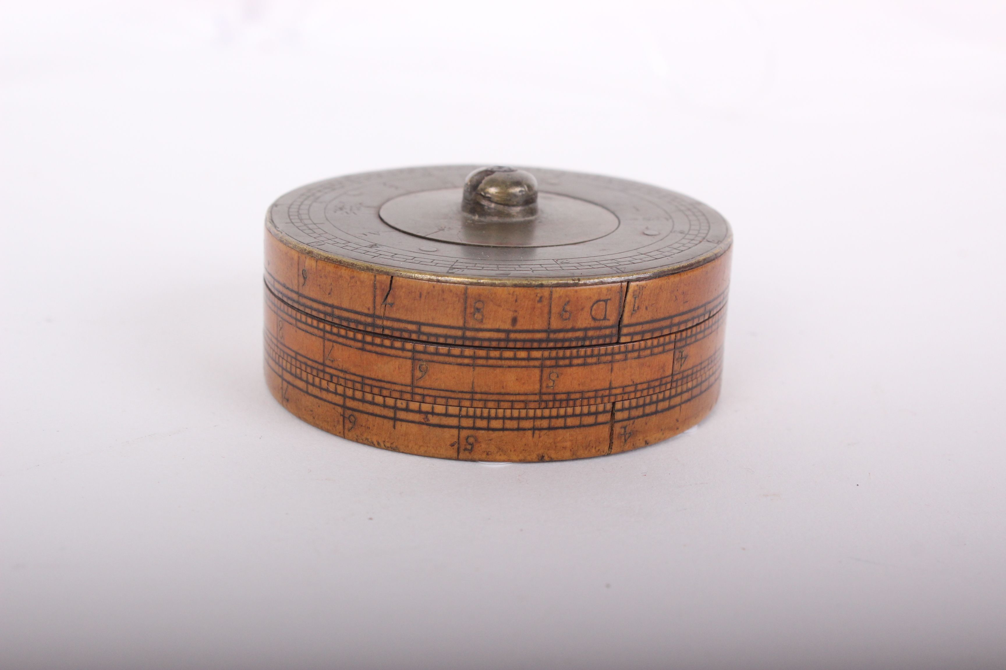 A late 18th century brass and boxwood cylindrical calculator, the top section rotating with three - Image 2 of 4