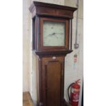 A 19th century longcase clock with thirty hour bell striking movement in a waisted oak case with