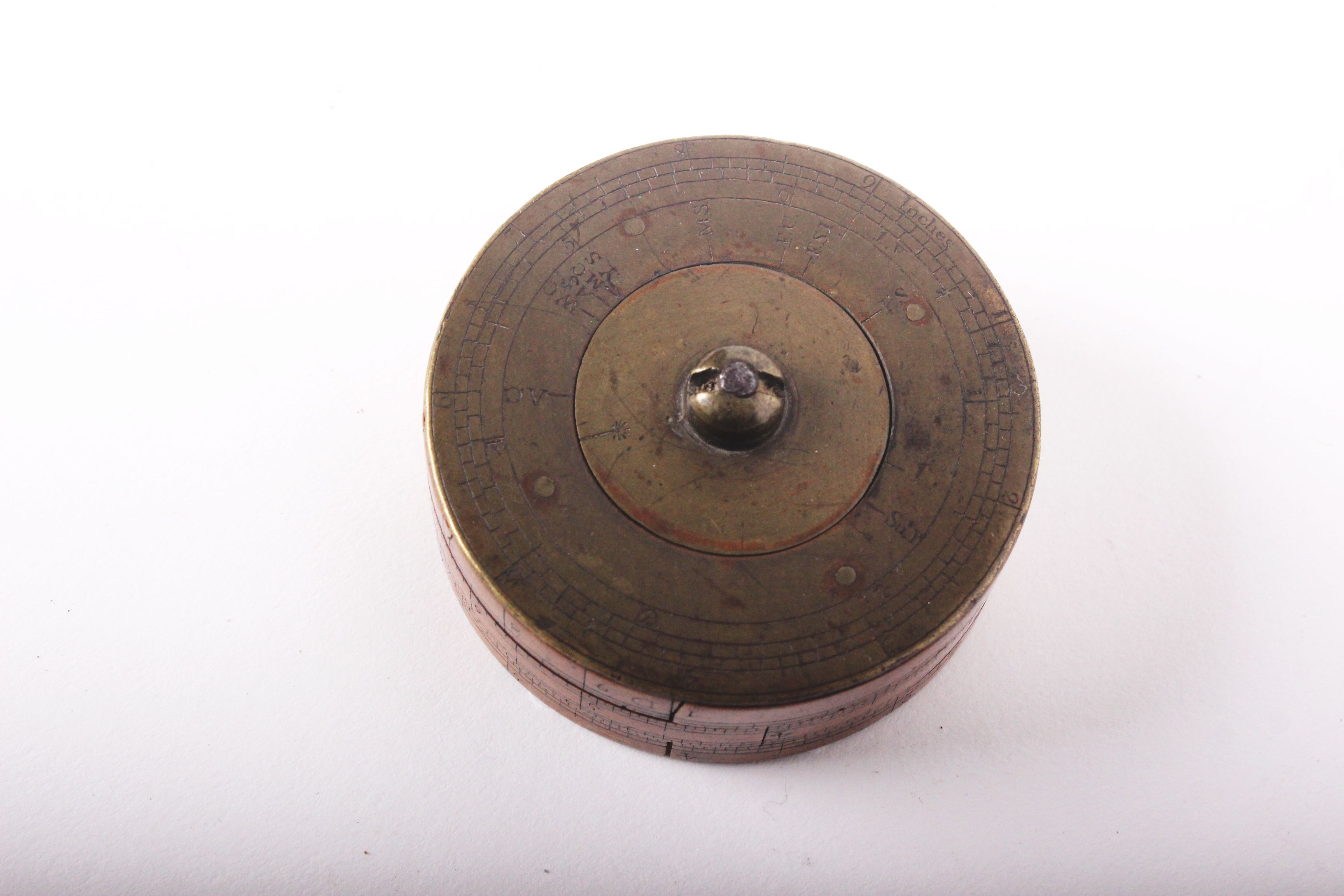 A late 18th century brass and boxwood cylindrical calculator, the top section rotating with three - Image 3 of 4