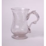 Glass: an engraved tankard dated 1767 and a collection of six stem glasses
