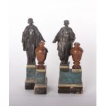 A pair of lead maquettes, cast from models by George J. Frampton, used as finals for Queen Mary's
