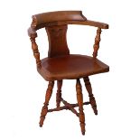 A walnut revolving desk chair, an oak framed woolwork fire screen and a set of stained wood