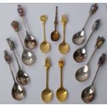 A set of ten modern silver and polychrome enamelled ‘Queens Beasts’ spoons, each terminal cast