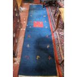 A blue ground wool modern runner