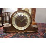 A 1930's mantel clock 20cm high, 30cm wide
