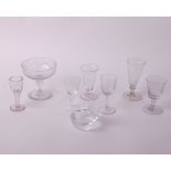 Glass: seven various stem glasses all hand blown and a crystal glass ashtray