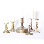 Metalware: Two pairs of brass pricket sticks, a heavy base 'bell' candle stick and four other items