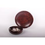 Two Jarrah Burl Australian bowls (Woodcraft Galleries), together with seventeen stone 'eggs'