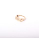 A 9ct gold and tiny diamond ten stone rectangular signet ring with rolex-style stepped shoulders,