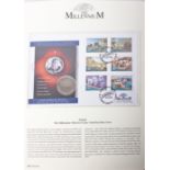 A Millennium coin cover collection in two albums including Canada silver maple leaf and US silver