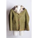 A 1960s faux ocelot print coat; a dyed green sheepskin jacket, a cropped mink jacket, a grey