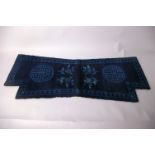 A Chinese/Mongolian indigo and midnight blue woollen saddle rug; showing a stylised design of a deer
