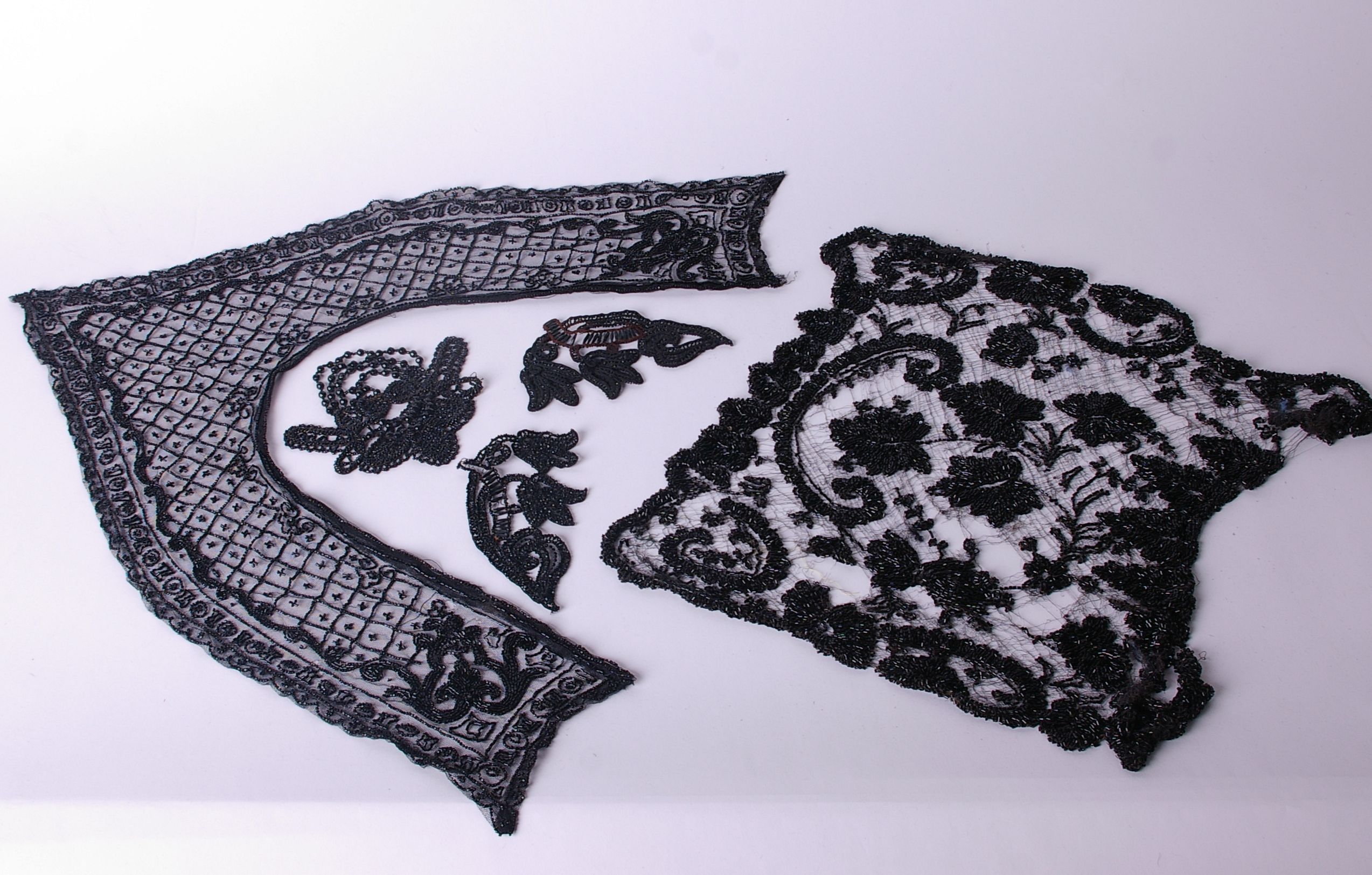 A collection of late 19th and early 20th Century jet and bead trimmings; a black silk embroidered - Bild 3 aus 3