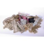 A collection of passementerie, beaded motifs, edgings, net and lace panels, beads, diamanté trim,