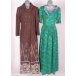 A 1970s blue, green and mustard floral patterned fine wool maxi dress; a Troubador black, brown