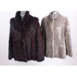 A mahogany coney fur jacket; a musquash fur wrap with crochet and fur tassels, a grey rabbit fur