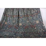 A pair of early 20th Century William Morris Violet and Columbine lined woven woollen curtains;