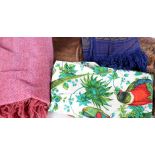 A mixed lot of textiles; a green bedcover, an embroidered throw, a chenille cushion cover, a pair of