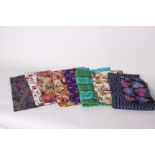 A collection of textiles including; floral fabrics from the 1950s, 1960s, 1970's and 1980s,