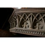 A 19th century or earlier pine octagonal font cover with well carved frieze. In need of restoration,