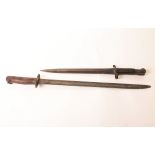 Two bayonets: marked 1903 with other stamped markings, 42cm long; the other indistinct markings,