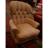 A Victorian style button upholstered armchair, together with a slat top coffee/lamp table