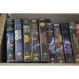 A collection of video and DVD's mostly Dr Who, Star Wars, etc (2 shelves)