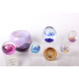 A collection of seven Caithness paperweights, all boxed, two Caithness art glass bowls, boxes and